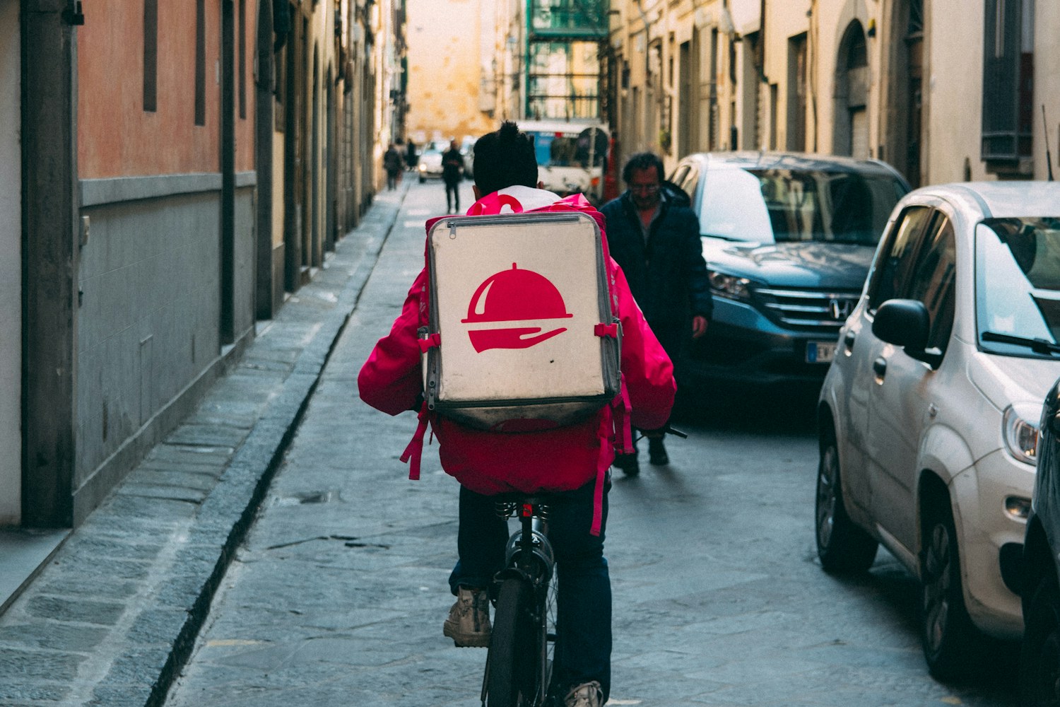 A delivery partner riding through the city